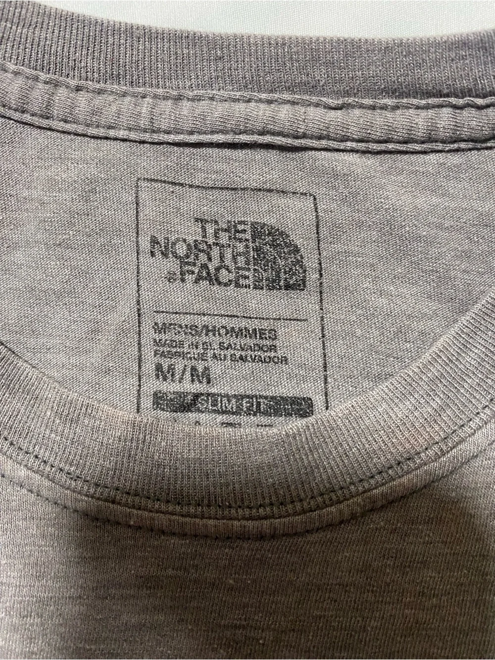 The North Face Men's Gray Logo Short-Sleeve Tee with Maroon and Blue Accents